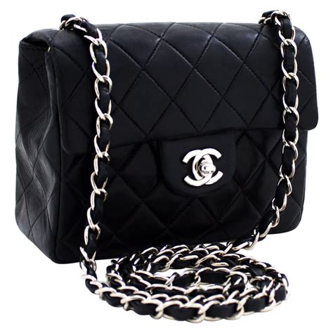 black chanel bag silver chain|black chanel bag with gold chain.